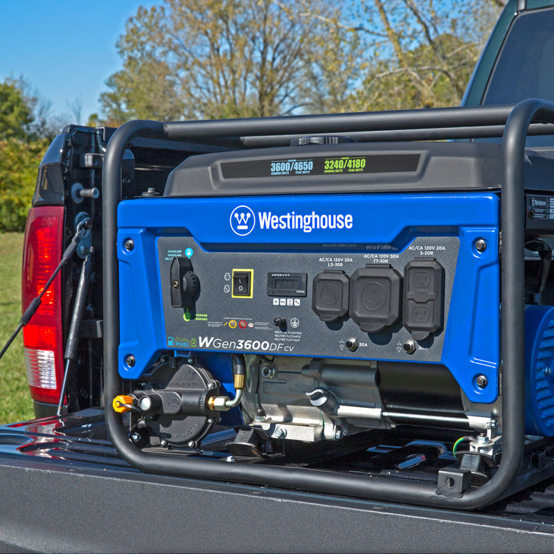 Westinghouse | WGen3600DFcv portable generator shown on a truck tailgate with trees in the background