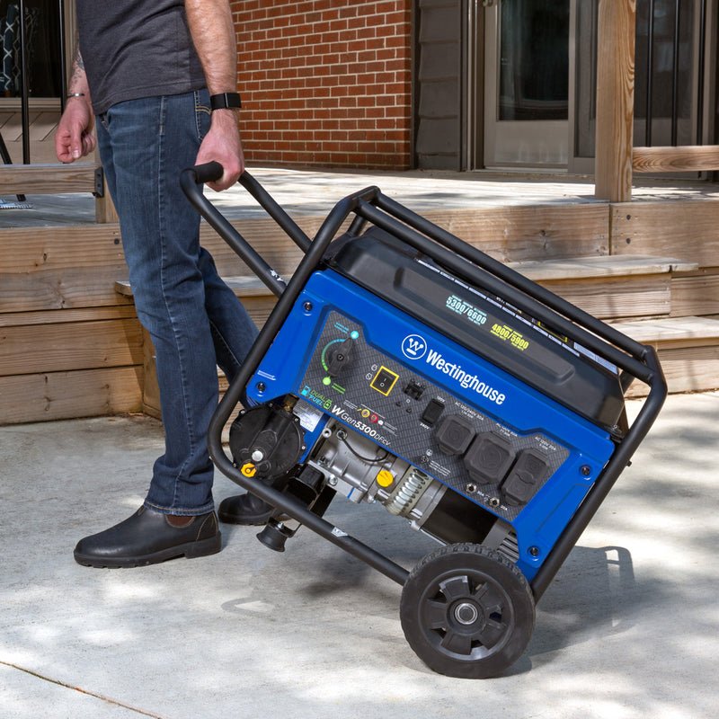 Westinghouse | WGen5300DFcv portable generator shown being pulled to the backyard