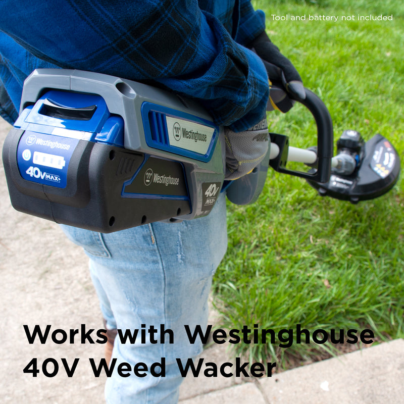 A person hold the westinghouse 40V string trimmer and edger.
