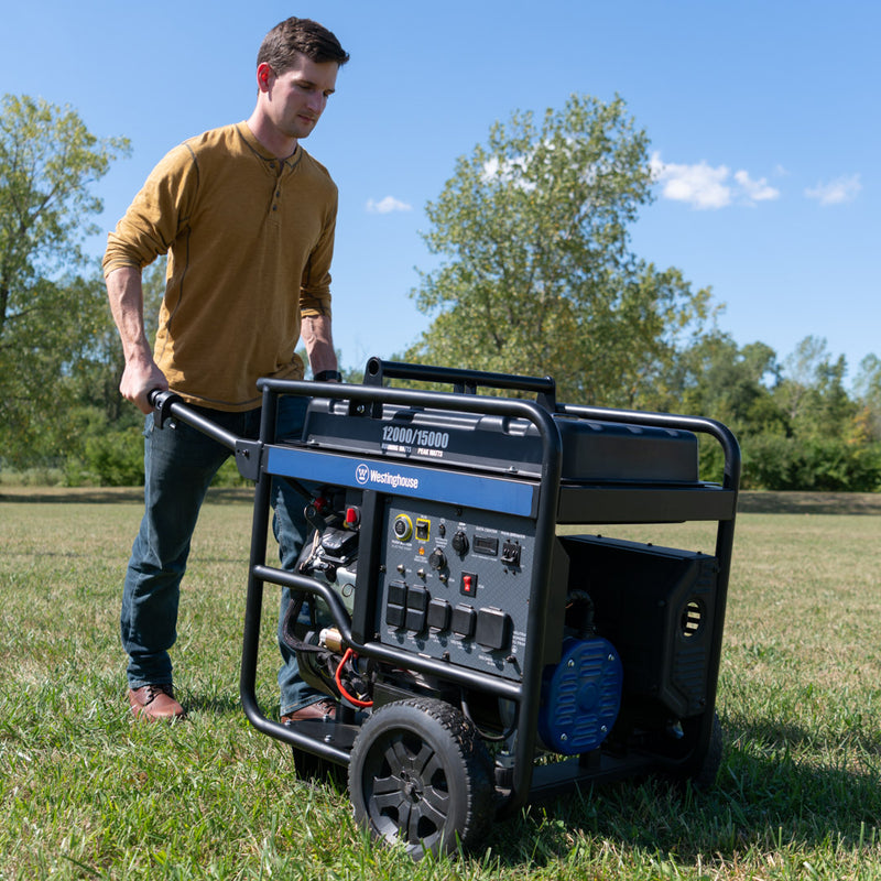 Westinghouse | WGen12000 portable generator being wheeled through grass.