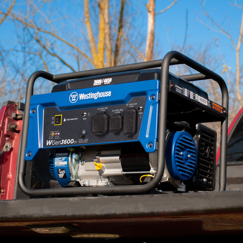Westinghouse | WGen3600cv portable generator sitting on the tailgate of a pickup truck.
